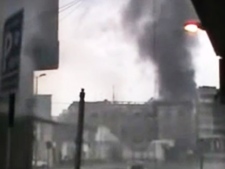 This image made from amateur video and released by the Syria media centre Thursday, March 29, 2012, purports to show black smoke riding from buildings in Homs, Syria. (AP Photo/Syria Media Center via APTN)