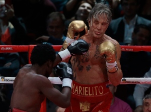 Mickey Rourke defeats younger boxer