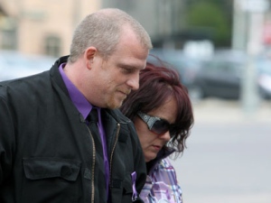 Rodney Stafford father of slain Victoria (Tori) Stafford and Patrina Fraser walk into court with for the Michael Rafferty murder trial in London, Ont., Friday, March, 30, 2012. Rafferty has pleaded not guilty to first-degree murder, sexual assault causing bodily harm and kidnapping. THE CANADIAN PRESS/Dave Chidley