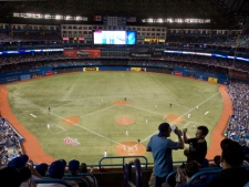 Toronto Blue Jays fans react during the eighth inning of the Blue Jay's home opener against Boston Red Sox in Toronto on Monday April 9, 2012. (THE CANADIAN PRESS/Chris Young)