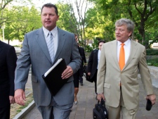 Former Major League Baseball pitcher Roger Clemens and his attorney Rusty Hardin arrive at federal court in Washington on Monday, April 16, 2012, for jury selection in Clemens' perjury trial. Clemens is accused of lying when he told Congress he never used steroids and human growth hormone. (AP Photo/Manuel Balce Ceneta)