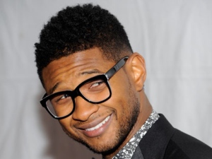 In this Nov. 17, 2011 file photo, singer Usher Raymond attends the "Pencils Of Promise" inaugural gala at Espace in New York. Usher will join the cast of �Fuerza Bruta: Look Up,� the fast-paced, acrobatic play where the audience stands as �performers run through moving walls and frolic in a watery world suspended just above the audience.� He will perform at two shows as its lead �Running Man� on April 28 at the Daryl Roth Theatre. (AP Photo/Evan Agostini)