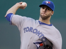 Toronto Blue Jays starting pitcher Brandon Morrow throws during the first inning of a baseball game against the Kansas City Royals on Monday, April 23, 2012, in Kansas City, Mo. (AP Photo/Charlie Riedel)