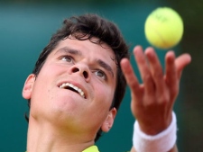 Milos Raonic of Canada serves the ball to Spain's Albert Montanes, during their match at the Monte Carlo Tennis Masters tournament in Monaco, Monday, April 16, 2012. (AP Photo/Claude Paris)