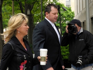 Retired Major League Baseball pitcher Roger Clemens and his wife Debra Lynn Godfrey arrive at federal fourt in Washington, Monday, April 23, 2012. (AP Photo/Susan Walsh)