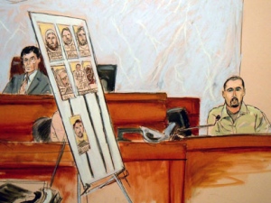 In this courtroom drawing, witness Najibulah Zazi right, testifies during the trial of his former classmate, Adis Medunjanin, in New York, Thursday, April 18, 2012. Medunjanin plead innocent to charges that he two other men conspired to use weapons of mass destruction, providing material support to a terrorist organization and other charges, when they planned on bombing New York City subways in 2009. On the bench is Judge John Gleeson. (AP Photo/Elizabeth Williams)