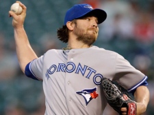 Toronto Blue Jays starting pitcher Kyle Drabek throws to the Baltimore Orioles in the second inning of a baseball game in Baltimore on Wednesday, April 25, 2012. (AP Photo/Patrick Semansky)