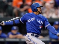 Toronto Blue Jays' Eric Thames watches his single in the second inning of a baseball game against the Baltimore Orioles in Baltimore on Thursday, April 26, 2012. (AP Photo/Patrick Semansky)