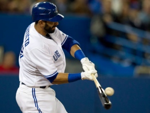 Toronto Blue Jays Jose Bautista pops up during third inning AL action against the Seattle Mariners in Toronto on Friday, April 27, 2012. (THE CANADIAN PRESS/Frank Gunn)