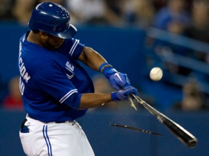 Toronto Blue Jay designated hitter Edwin Encarnacion hits a broken bat pop-fly during first inning AL action against the Seattle matiners in Toronto on Saturday April 28, 2012. THE CANADIAN PRESS/Frank Gunn