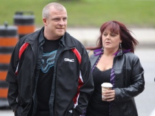 Rodney Stafford, father of slain Victoria Stafford, and girlfriend Patrina Fraser arrive at the courthouse in London, Ont., for the trial of Michael Rafferty on Tuesday, May 1, 2012. (THE CANADIAN PRESS/Geoff Robins)