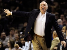 This Dec. 28, 2011 file photo shows San Antonio Spurs head coach Gregg Popovich gesturing during the first half of an NBA basketball game against the Los Angeles Clippers, in San Antonio. Popovich is the NBA's Coach of the Year after leading the San Antonio Spurs to 50 wins in the lockout-shortened season and the No. 1 seed in the Western Conference. The announcement came on Tuesday, May 1, 2012. (AP Photo/Bahram Mark Sobhani)