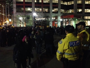 Demonstrators are seen in Simcoe Park on Tuesday, May 1, 2012. 