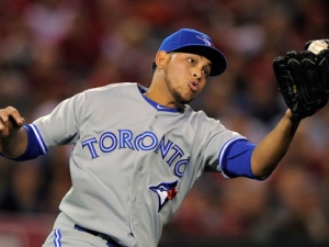 Toronto Blue Jays starting pitcher Henderson Alvarez makes a catch on a ball hit by Los Angeles Angels' Torii Hunter during the fourth inning of their baseball game, Friday, May 4, 2012, in Anaheim, Calif. (AP Photo/Mark J. Terrill)