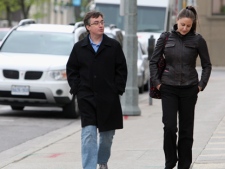 Dirk Derstein and Laura Giordano, defence lawyers, walk into court for proceedings in the Michael Rafferty murder trial in London, Ont., Monday, May 7, 2012. Rafferty has pleaded not guilty to first-degree murder, sexual assault causing bodily harm and kidnapping. (THE CANADIAN PRESS/Dave Chidley)