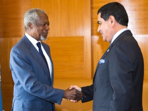 The Joint Special Envoy for Syria Kofi Annan, left, and President of the United Nations General Assembly Nassir Abdulaziz Al-Nasser, right, shake hands before their official talks at the European headquarters of the United Nations, in Geneva, Switzerland, on Tuesday, May 8, 2012. (AP Photo/Keystone, Salvatore Di Nolfi)