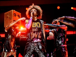 In this Dec. 9, 2011 file photo, singer RedFoo, center, and LMFAO perform at Z100's Jingle Ball concert at Madison Square Garden in New York. (AP Photo/Evan Agostini)