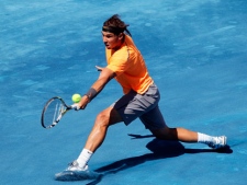 Rafael Nadal from Spain returns the ball during a Madrid Open tennis tournament match against his compatriot Fernando Verdasco, in Madrid on Thursday, May 10, 2012. (AP Photo/Andres Kudacki)