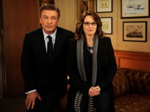 In this 2011 image released by NBC, Alec Baldwin portrays Jack Donaghy, left, and Tina Fey portrays Liz Lemon in the NBC comedy series, "30 Rock." NBC says �30 Rock� will be returning next season for a final, abbreviated run. (AP Photo/NBC, Ali Goldstein)