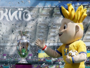 Mascot Slavko performs at the Euro 2012 trophy display in Kiev, Ukraine on Friday, May 11, 2012. (AP Photo/Efrem Lukatsky)