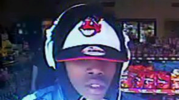 Police Release Surveillance Camera Image Of Suspect Wanted In Bank