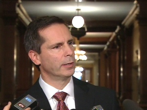 Ontario Premier Dalton McGuinty speaks to reporters outside his office at Queen's Park in Toronto, Wednesday, Nov. 26, 2008.