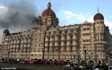 Firefighters try to douse a fire at the Taj Mahal hotel in Mumbai, India, Thursday, Nov. 27, 2008. (AP Photo)