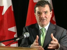 Finance Minister Jim Flaherty speaks to reporters at the Saint John Board of Trade in Saint John, N.B., Friday, Dec. 12, 2008.