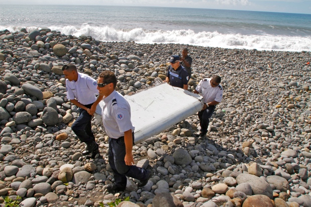 Malaysia confirms Flight 370 course was on pilot's home flight