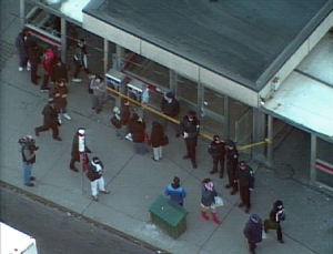 Police stand guard outside the entrance to Dufferin subway station following an emergency incident on Friday, Feb. 13, 2009.