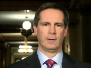 Ontario Premier Dalton McGuinty speaks with reporters from Queen's Park in Toronto, Wednesday, Feb. 18, 2009.