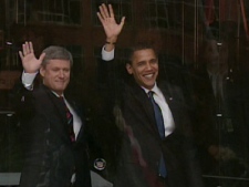 Prime Minister Stephen Harper and U.S. President Barack Obama wave to crowds gathered outside Parliament Hill in Ottawa on Thursday, Feb. 19, 2009.