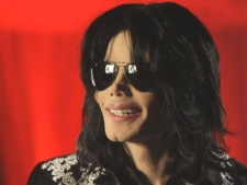 US singer Michael Jackson announces that he is set to play ten live concerts at the London O2 Arena in July, which he announced at a press conference at the London O2 Arena, Thursday, March 5, 2009. (AP / Joel Ryan)