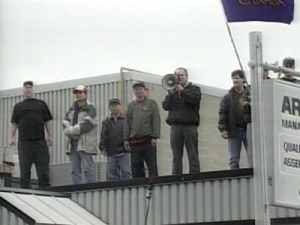 CAW workers protest at the site of a shut-down auto parts plant in Windsor, Ont. on Wednesday, March 18, 2009.