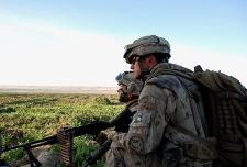 Canadian Master Cpl. Scott Vernelli (right), of November Company 3rd Battalion Royal Canadian Regiment and another unidentified soldier set up a defensive position during an assault on a Taliban command centre and supply base in Zhari District Afghanistan on Saturday, March 7, 2009.Vernelli was one of four Canadian soldiers killed in two separate bombings outside of Kandahar city. THE CANADIAN PRESS/Murray Brewster 