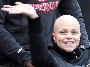 Jade Goody leaves her home in a wheelchair in Upshire, England on Feb. 19 2009. (AP Photo / pa, Stefan Rousseau)