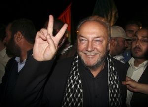 George Galloway gestures after having crossed with his entourage from Egypt through the Rafah border crossing to Gaza, in Gaza City, Monday, March 9, 2009. (AP / Ashraf Amra)