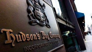 A man walks past the Hudson's Bay Company sign in downtown Toronto on Wednesday, Feb. 4, 2009. (Nathan Denette/The Canadian Press)
