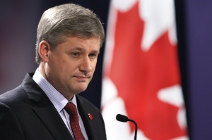 Prime Minister Stephen Harper speaks at a press conference at the end of the G20 Summit at the Excel centre in London, Thursday, April 2, 2009. (AP / Kirsty Wigglesworth)