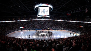 Canadians don hockey jerseys to honor dead in bus crash