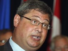 Ontario Health Minister David Caplan responds to media questionsat a news conference in Quebec City, Thursday, Sept.4, 2008 in Quebec City. (Jacques Boissinot / THE CANADIAN PRESS)