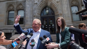 Ontario Premier-designate Doug Ford speaks to reporters before heading into Whitney Block for a meeting with his transition team in Toronto, Sunday, June 10, 2018. THE CANADIAN PRESS/Marta Iwanek
