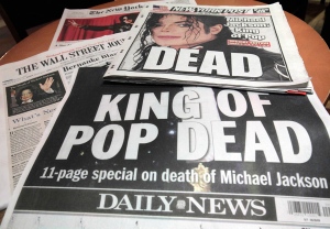 Newspaper front pages banner the death of Michael Jackson, in New York on Friday, June 26, 2009. (AP / Richard Drew)