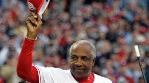 In this April 14, 2005, file photo, Washington Nationals manager Frank  Robinson tips his hat to the crowd as he is introduced during their home  opener against the Arizona Diamondbacks, at RFK