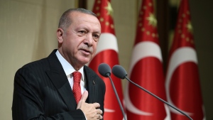 Turkish President Recep Tayyip Erdogan speaks during a reception on Republic Day, in Ankara, Turkey, Tuesday, Oct. 29, 2019. (Presidential Press Service via AP, Pool)