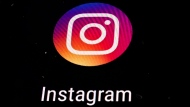 In this Nov. 29, 2018 file photo, the Instagram app logo is displayed on a mobile screen in Los Angeles. (AP Photo/Damian Dovarganes, File)

