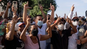 Anti-government protesters march in Havana, Cuba, Sunday, July 11, 2021. (AP Photo/Eliana Aponte, file) 