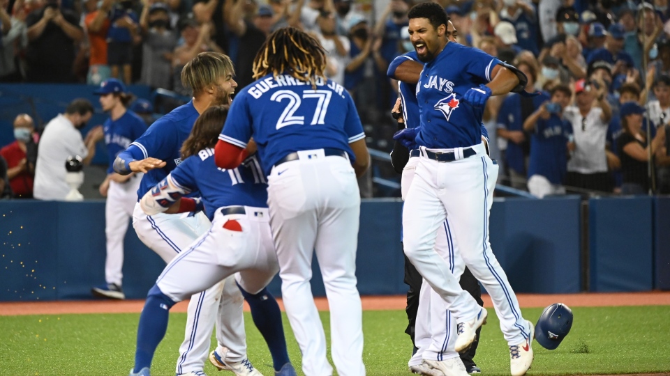 Blue Jays grind out 13-inning win over Red Sox