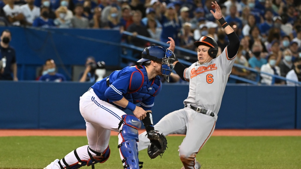 Orioles rally, halt Cubs' 5-game winning streak