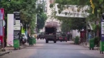 In this image made from video, a military truck is seen near the presidential palace in the capital Conakry, Guinea Sunday, Sept. 5, 2021. (AP Photo)